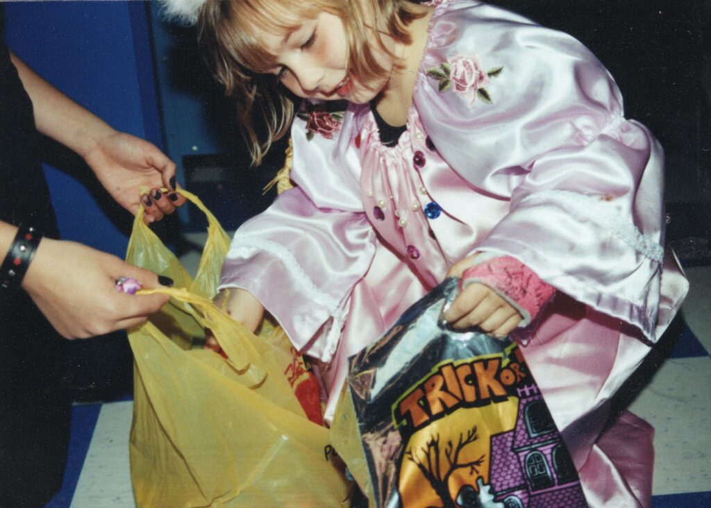 “Rapunzel” receives candy. Photo courtesy of Sheryl McCarthy.