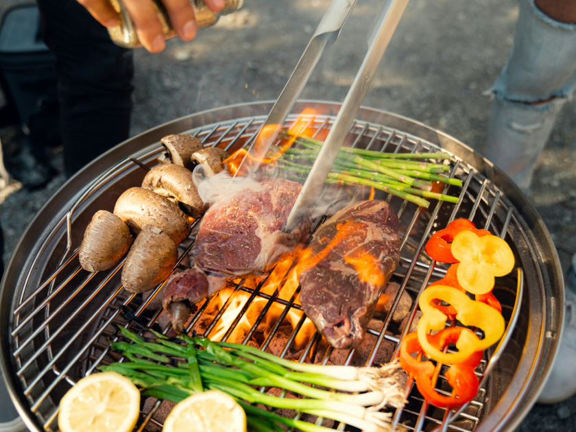 Steak and vegetables on a grill