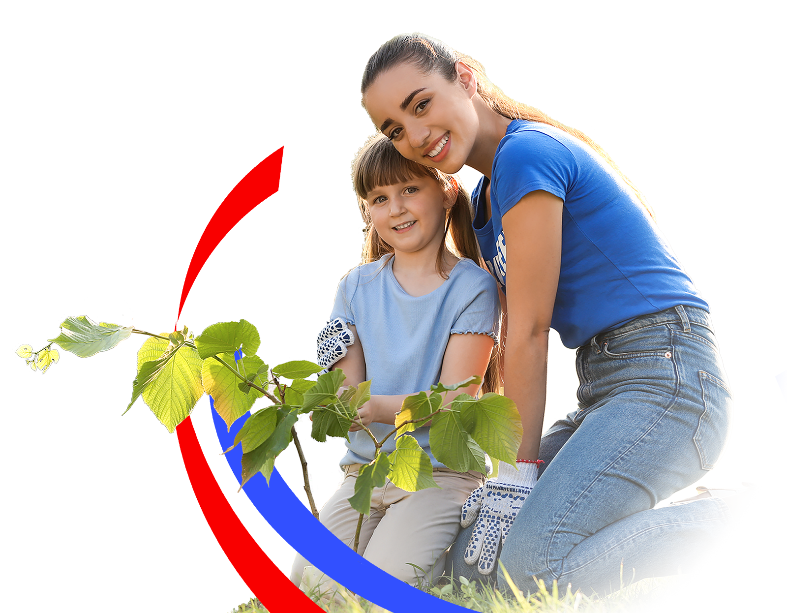 A woman and a small child planting a sapling while volunteering